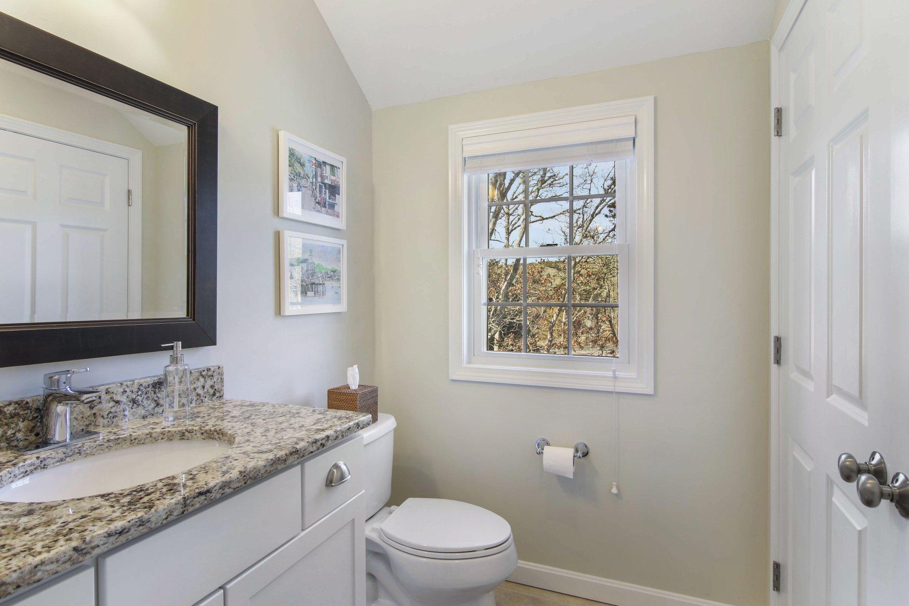 50 Katie Ford Road Chatham, MA 02633 - Photo 16 of 29 First floor powder room and laundry