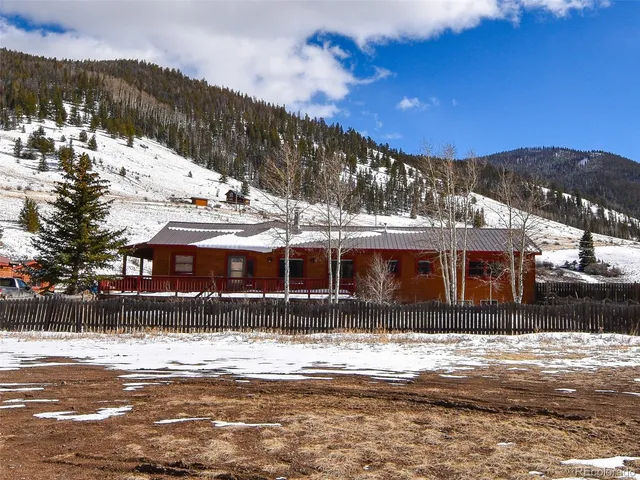 a view of a houses with a lake view