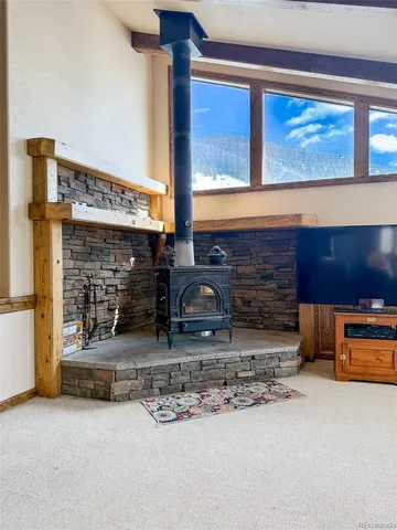a kitchen with stainless steel appliances granite countertop a sink and a granite counter tops