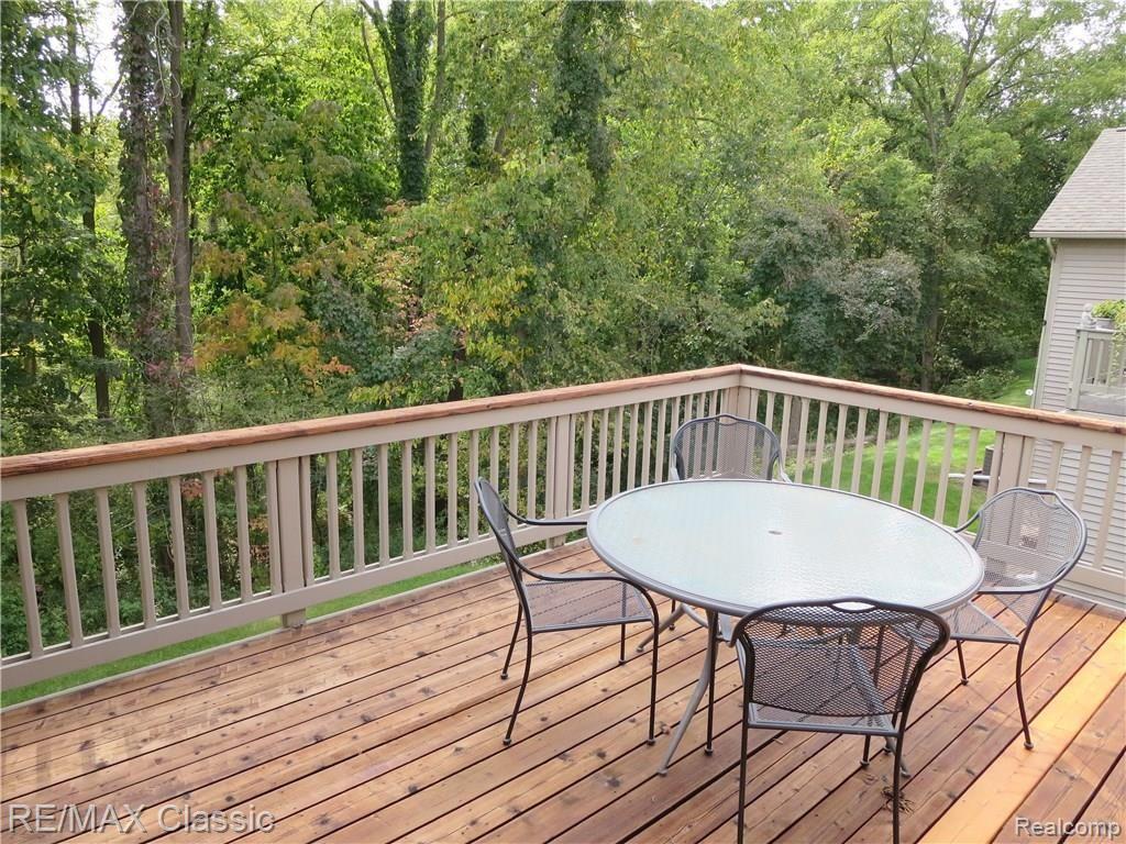 3092 Rivers Edge Drive Wayne, MI 48184 - Photo 11 of 40 Spacious deck and what a view of the wooded ravine..
