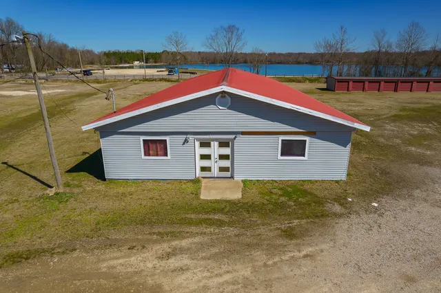 a house with yard and a large space