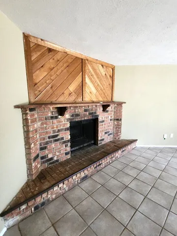 a living room with a fireplace