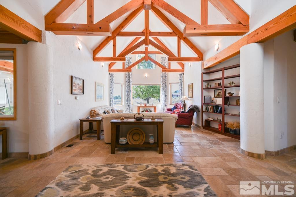 49 Pinon Drive Smith Valley, NV 89444 - Photo 23 of 45 a view of a big room with workspace and a window