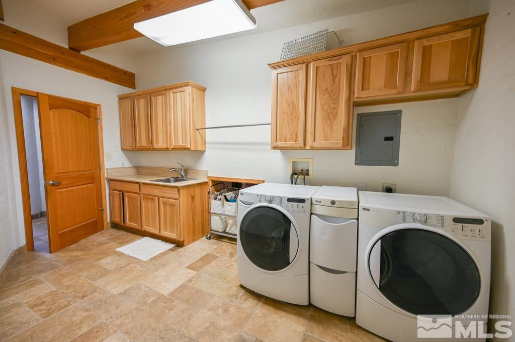 49 Pinon Drive Smith Valley, NV 89444 - Photo 27 of 45 a view of a kitchen with washer and dryer