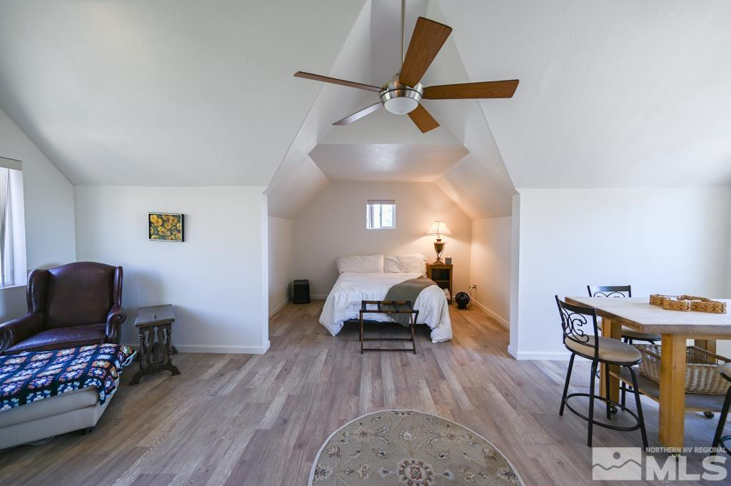 49 Pinon Drive Smith Valley, NV 89444 - Photo 35 of 45 a living room with furniture and wooden floor