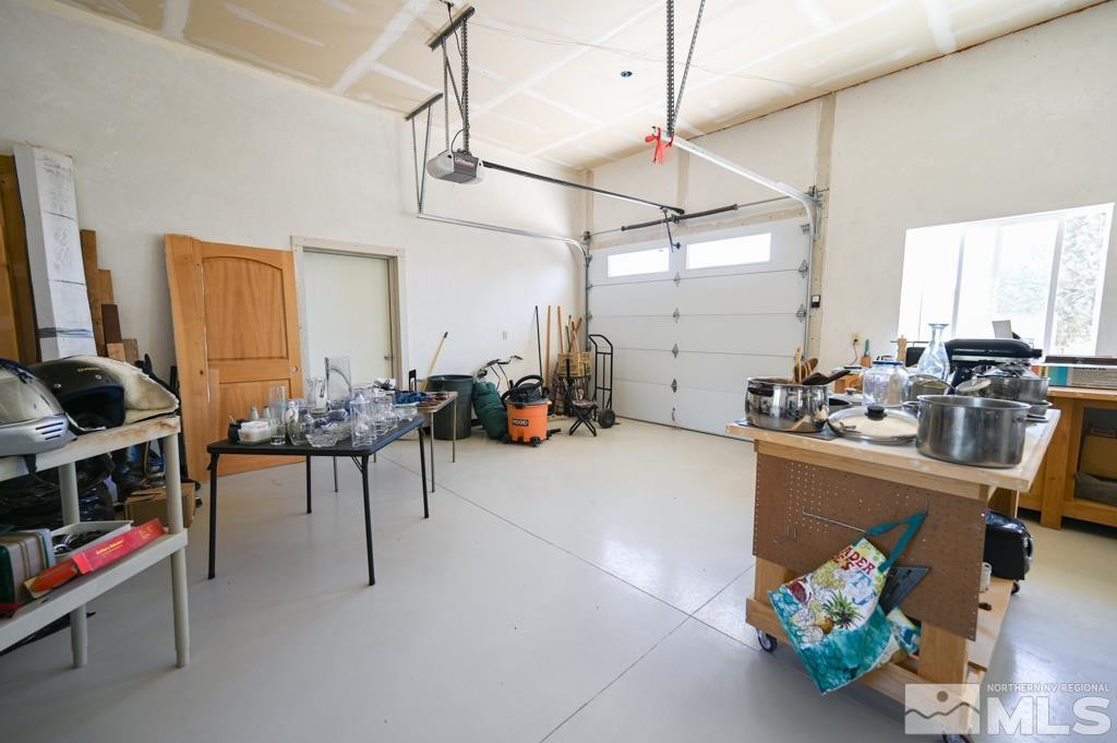 49 Pinon Drive Smith Valley, NV 89444 - Photo 39 of 45 a very nice looking room with many windows and furniture