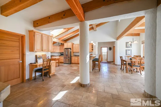 a view of kitchen with counter top space and appliances