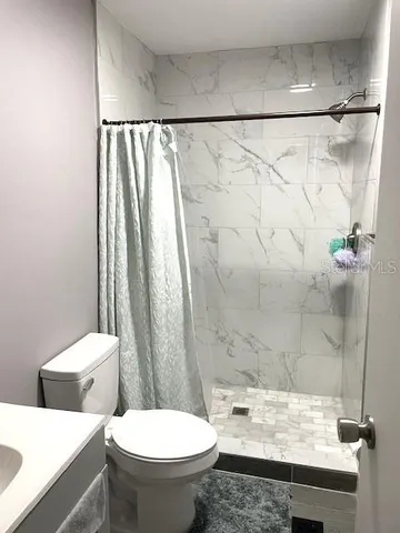 a backyard of a house with oven and yard