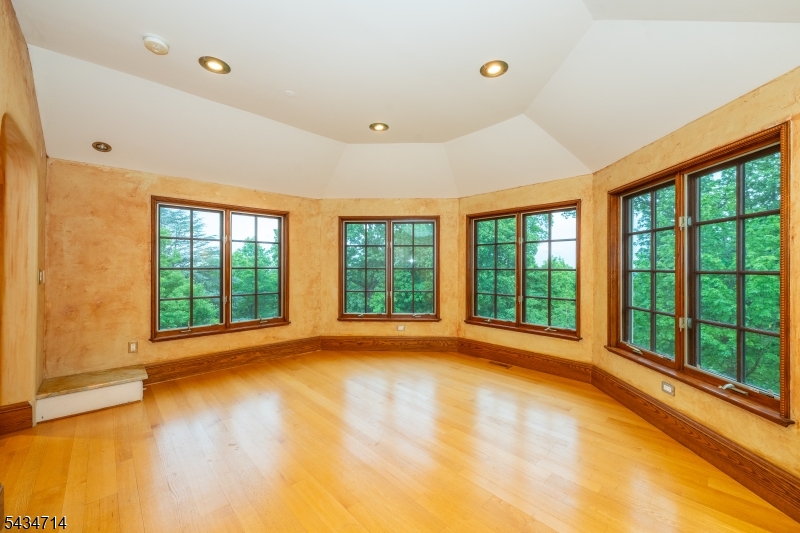 50 Rock Spring Road West Orange, NJ 07052 - Photo 40 of 50 a view of empty room with wooden floor and fan
