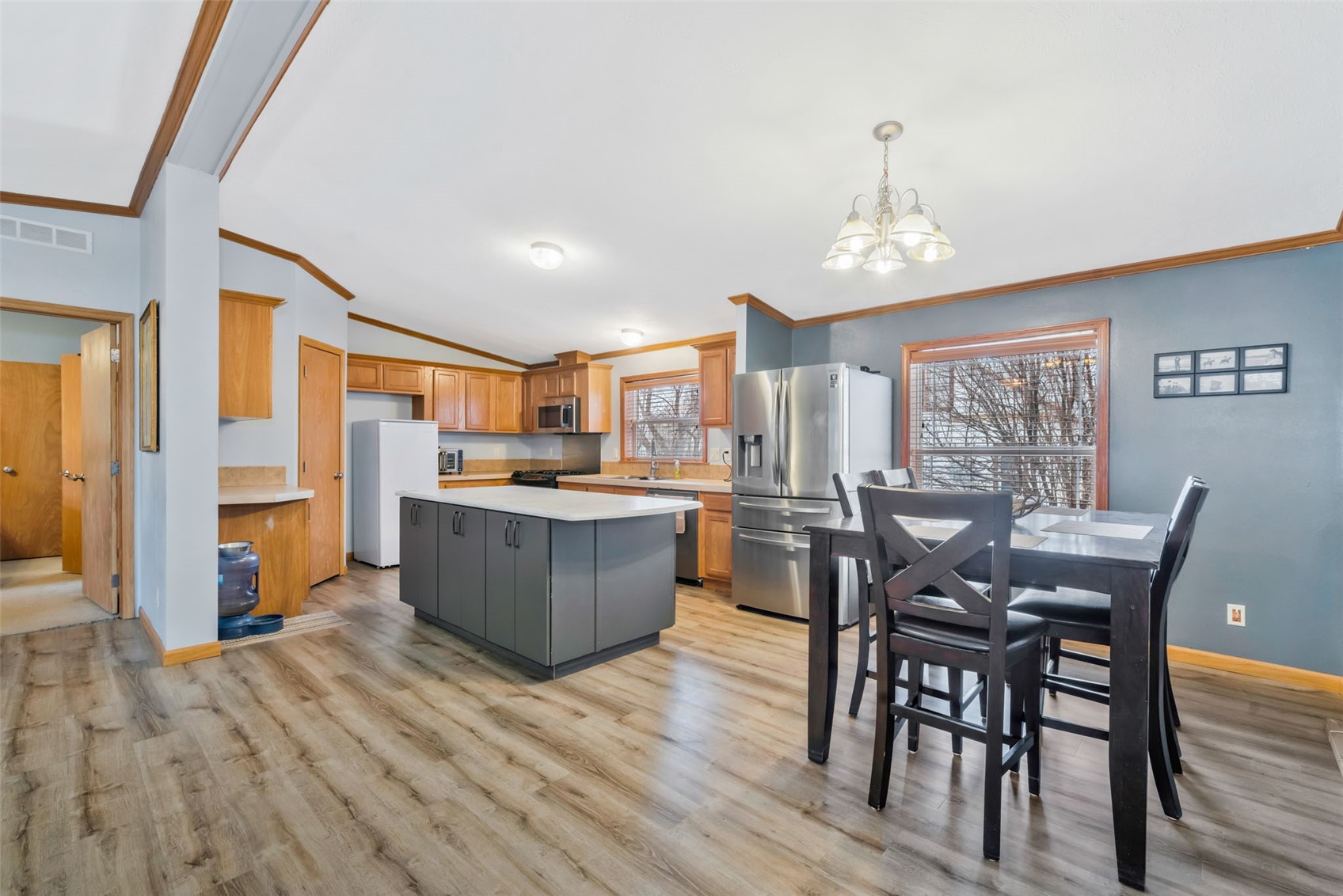 366 South 2nd Street Hayden, CO 81639 - Photo 5 of 38 a kitchen with stainless steel appliances wooden floors dining table and chair