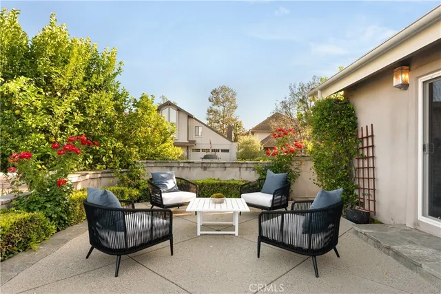 a outdoor living space with furniture and garden view