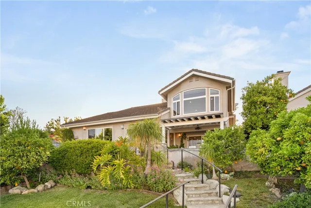 a spacious bathroom with a granite countertop tub sink and shower