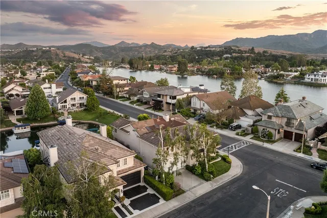an aerial view of a house with a garden