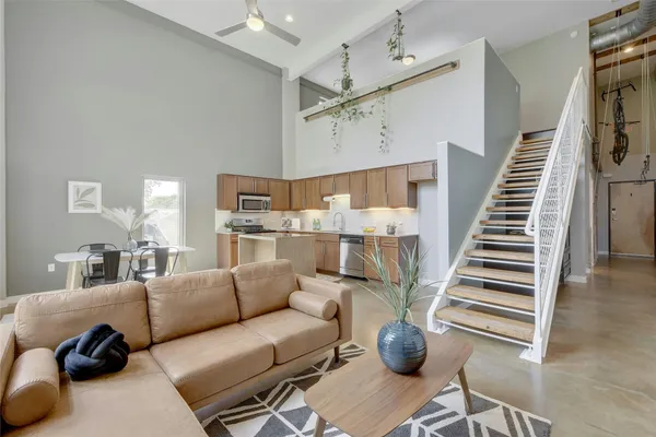 a view of livingroom with furniture and stairs