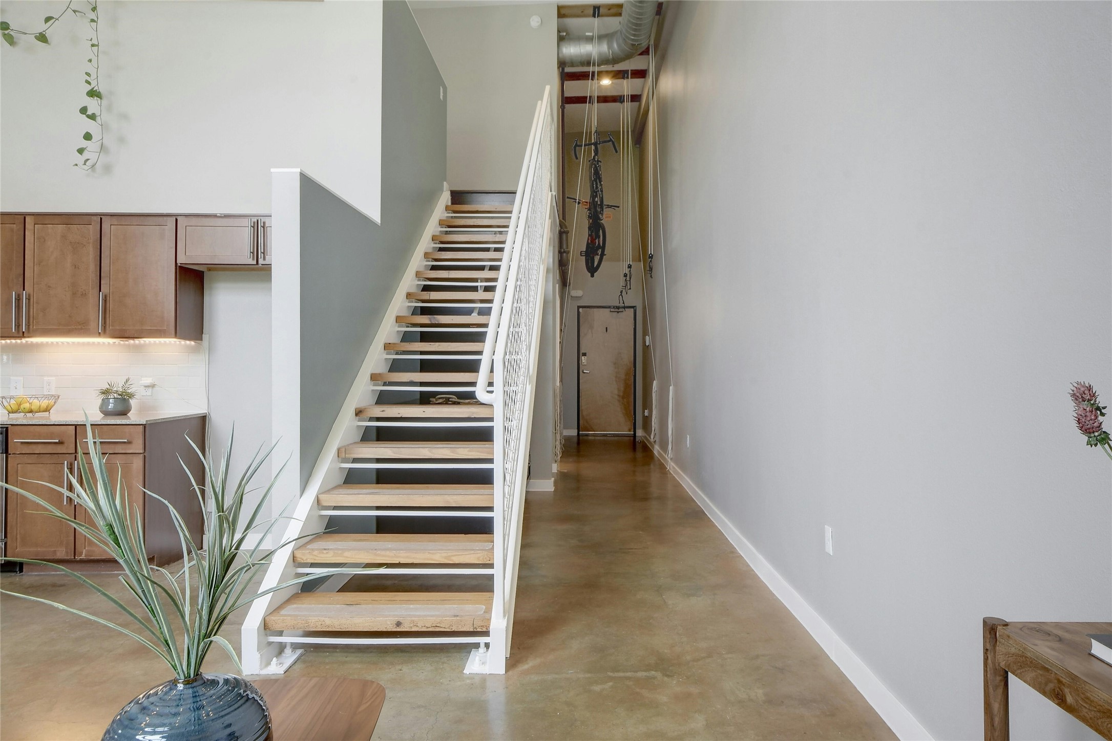 1601 East Cesar Chavez Street, Unit 201 Austin, TX 78702 - Photo 11 of 30 a view of entryway and hall with wooden floor