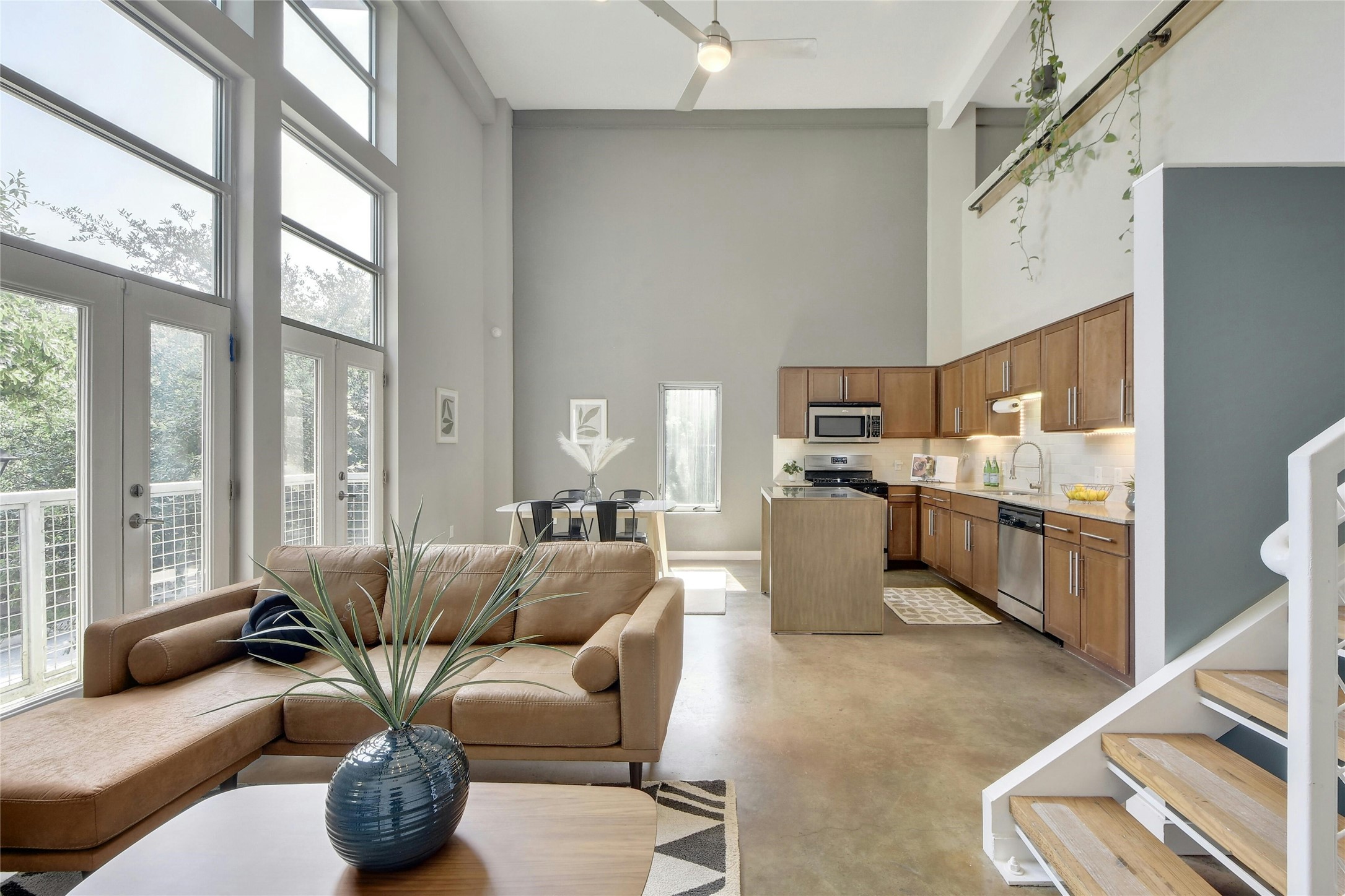 1601 East Cesar Chavez Street, Unit 201 Austin, TX 78702 - Photo 16 of 30 a living room with furniture and a large window
