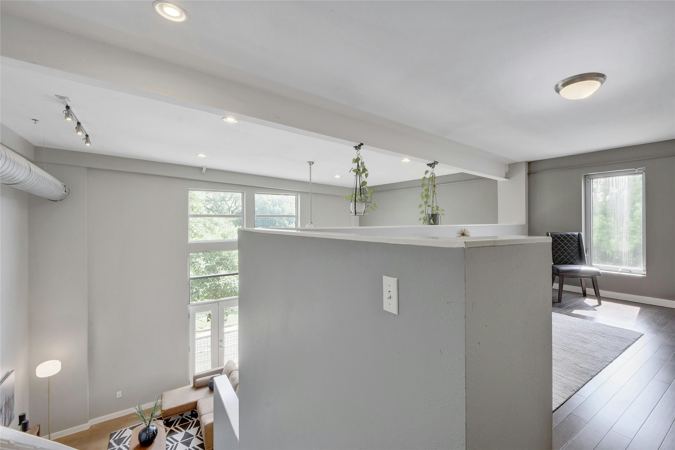 1601 East Cesar Chavez Street, Unit 201 Austin, TX 78702 - Photo 18 of 30 a view of a kitchen with kitchen island stainless steel appliances a sink and a window