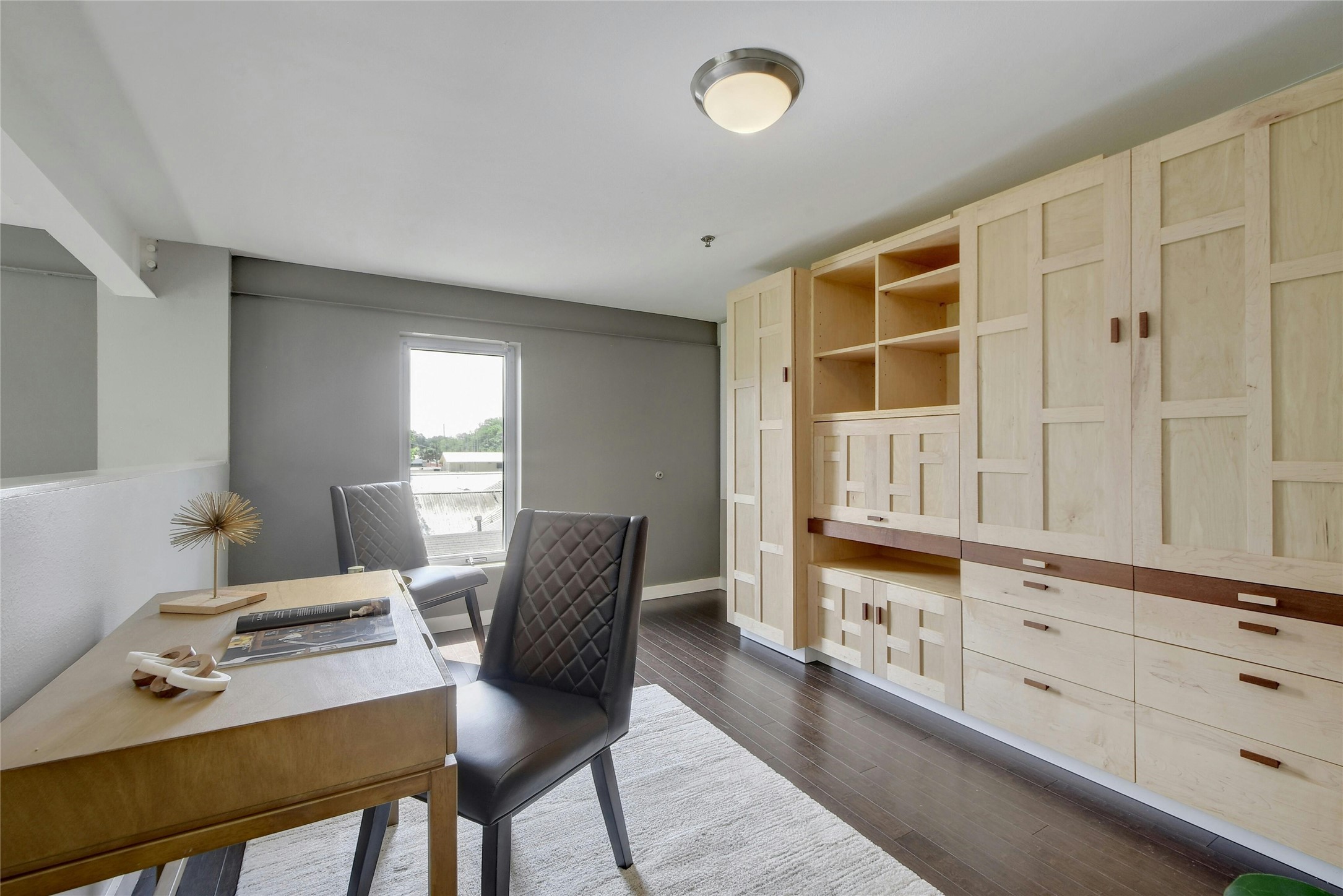 1601 East Cesar Chavez Street, Unit 201 Austin, TX 78702 - Photo 19 of 30 a workspace with furniture and window