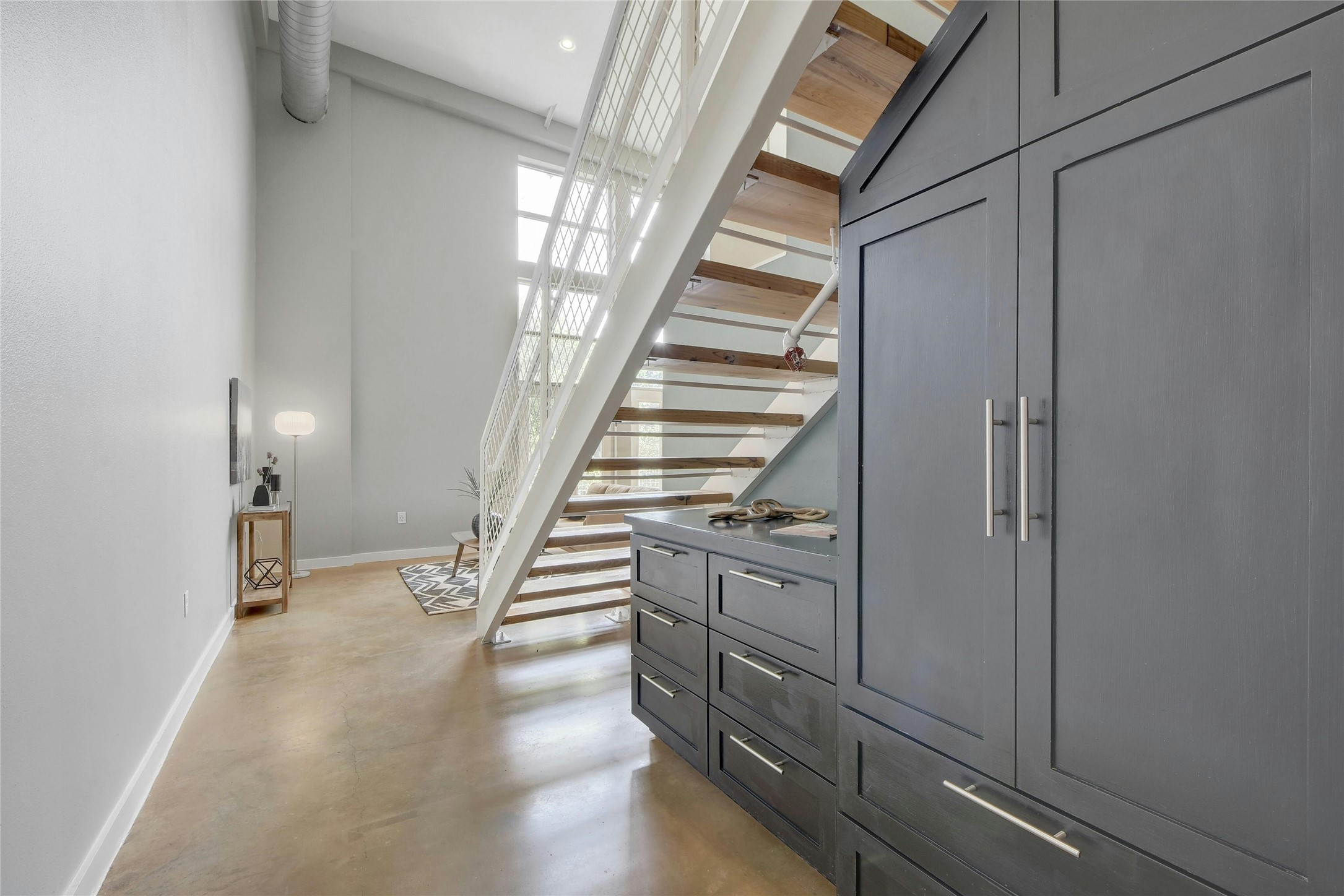 1601 East Cesar Chavez Street, Unit 201 Austin, TX 78702 - Photo 21 of 30 a view of an entryway with wooden floor