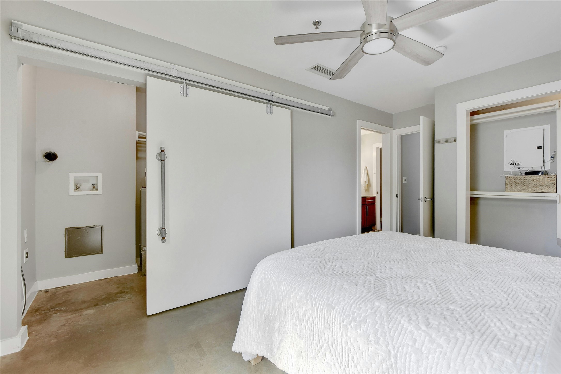 1601 East Cesar Chavez Street, Unit 201 Austin, TX 78702 - Photo 23 of 30 a large white bed in a white room