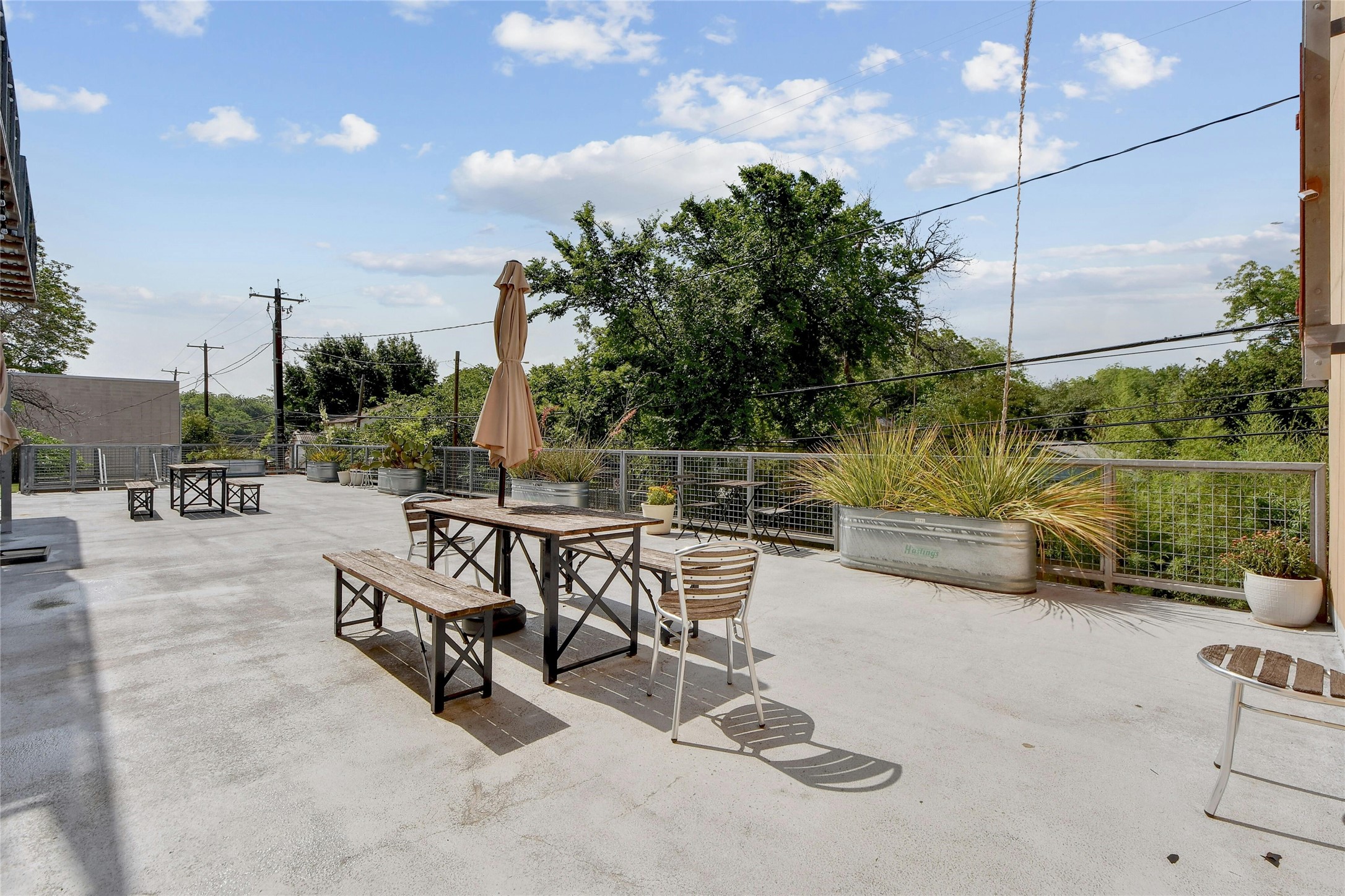 1601 East Cesar Chavez Street, Unit 201 Austin, TX 78702 - Photo 26 of 30 a view of a patio with a table and chairs