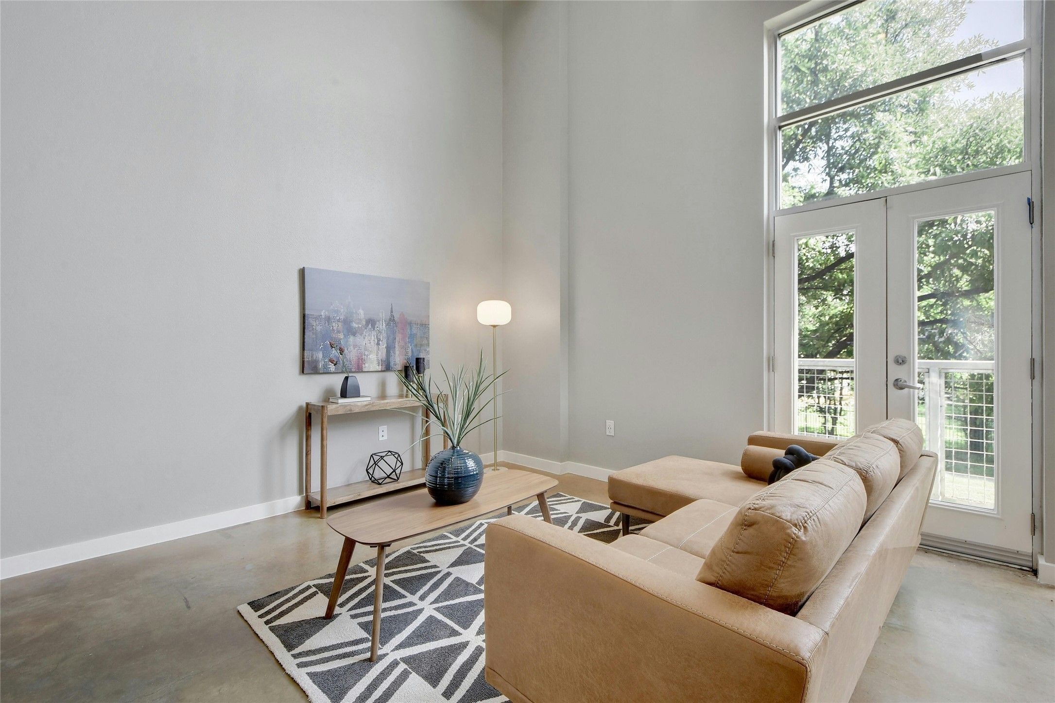 1601 East Cesar Chavez Street, Unit 201 Austin, TX 78702 - Photo 5 of 30 a living room with furniture and a window