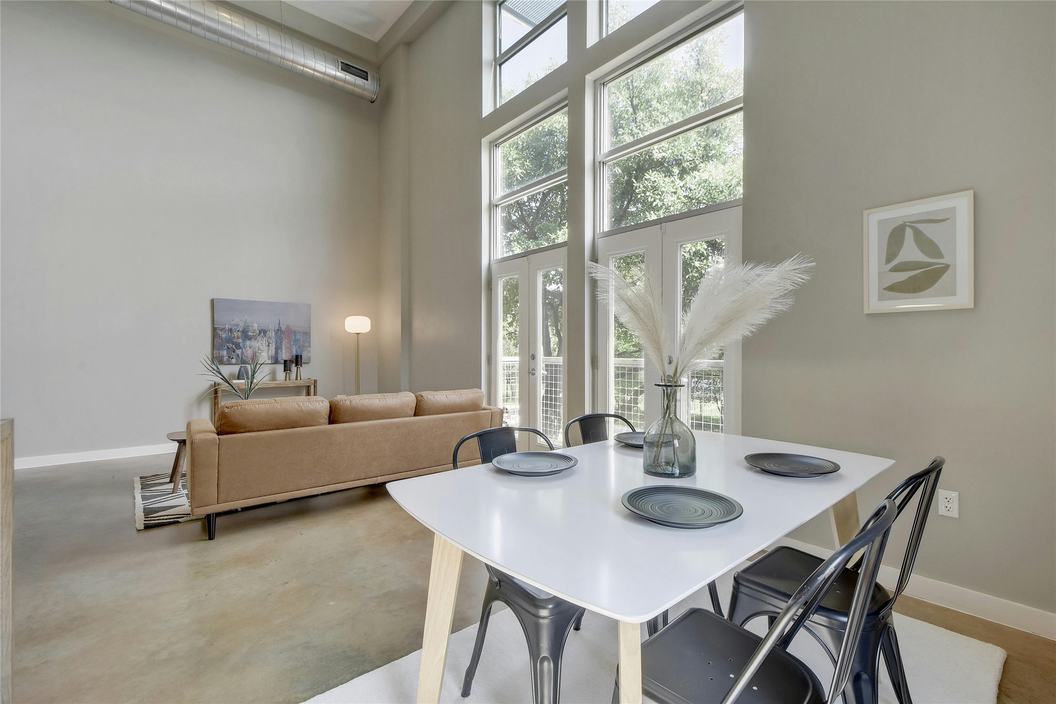 1601 East Cesar Chavez Street, Unit 201 Austin, TX 78702 - Photo 6 of 30 a living room with furniture and a large window