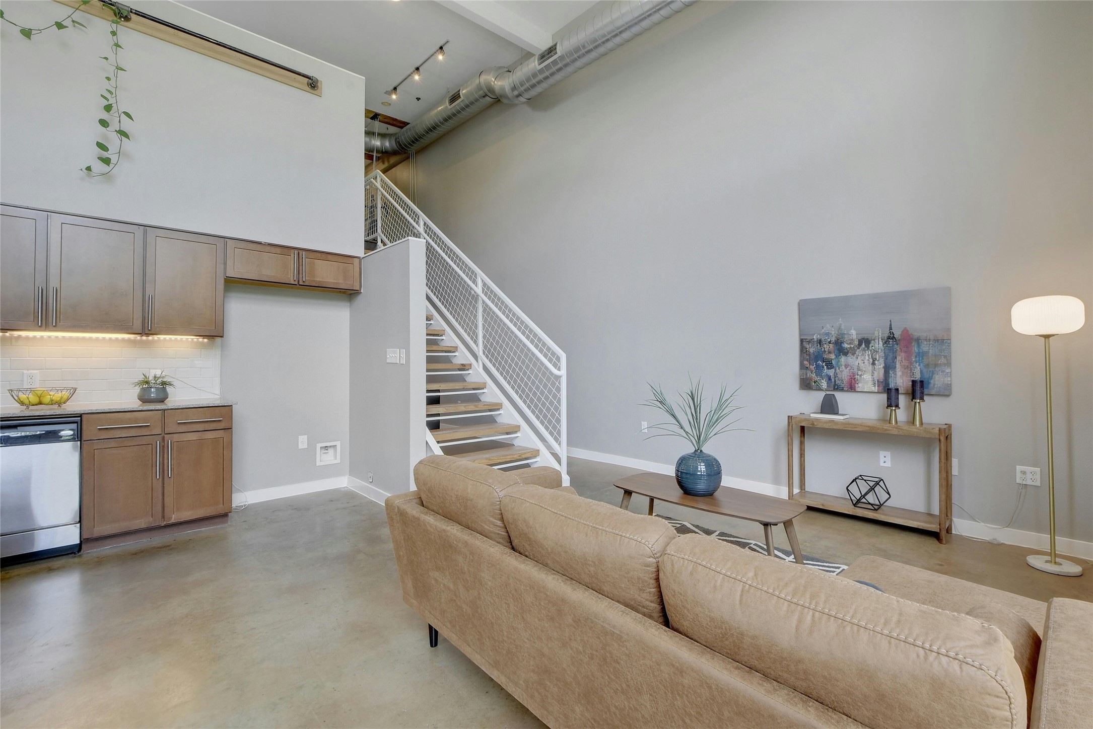 1601 East Cesar Chavez Street, Unit 201 Austin, TX 78702 - Photo 8 of 30 a living room with furniture and a wooden floor