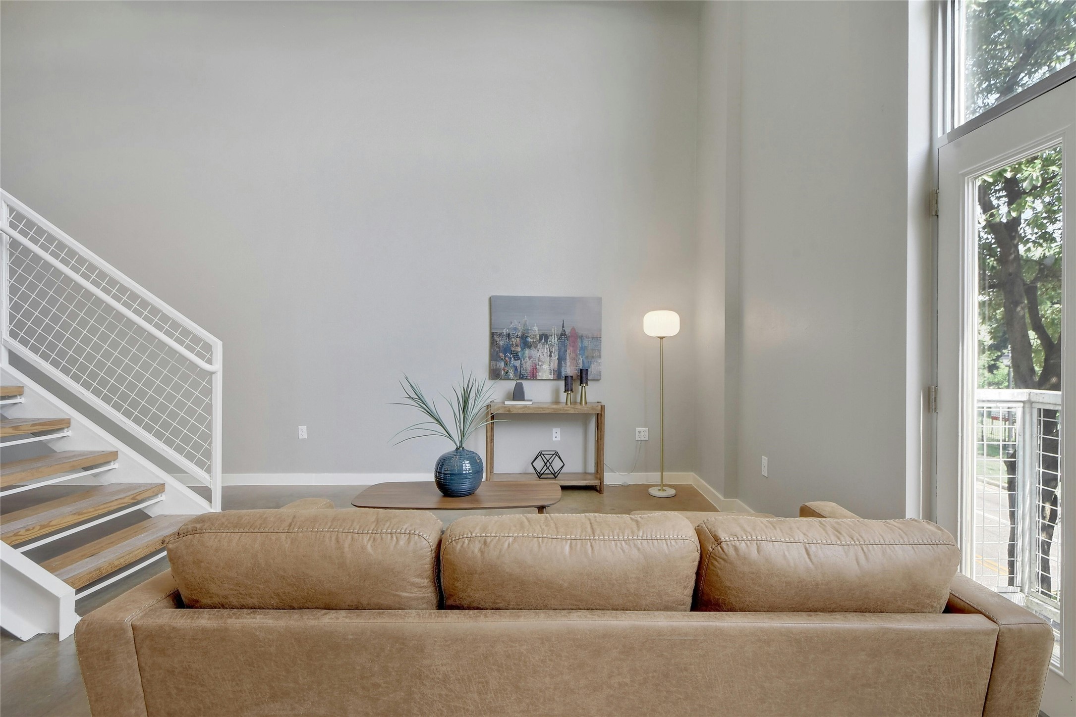 1601 East Cesar Chavez Street, Unit 201 Austin, TX 78702 - Photo 9 of 30 a living room with furniture and a window