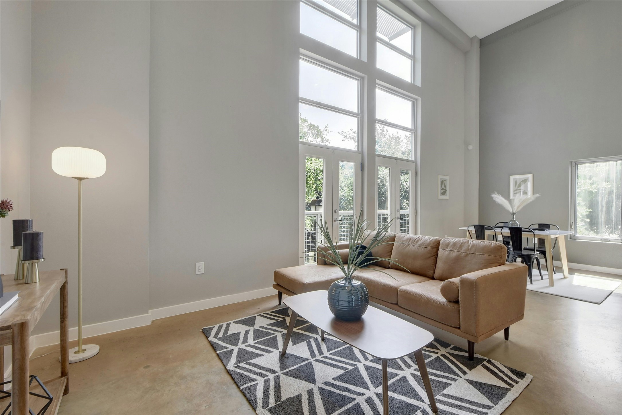 1601 East Cesar Chavez Street, Unit 201 Austin, TX 78702 - Photo 10 of 30 a living room with furniture and a large window