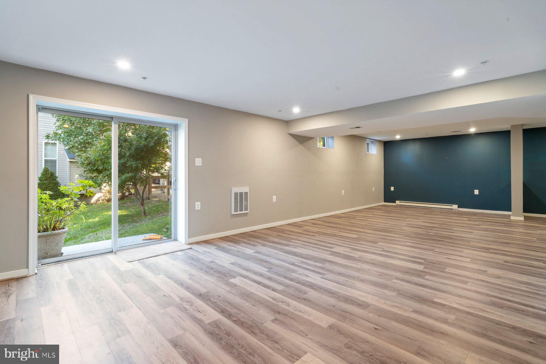 6709 Oakridge Road New Market, MD 21774 - Photo 32 of 53 Finished basement with walk-out to back yard