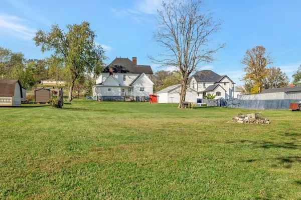 a view of a house with a big yard