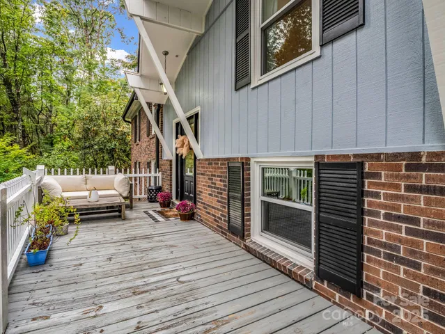 a view of a deck with furniture