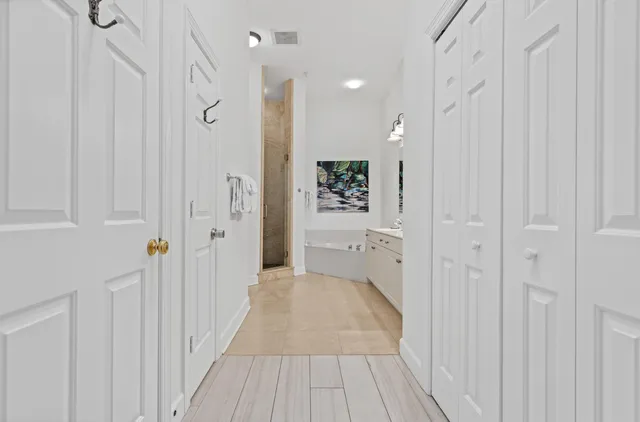 a bathroom with a shower and toilet