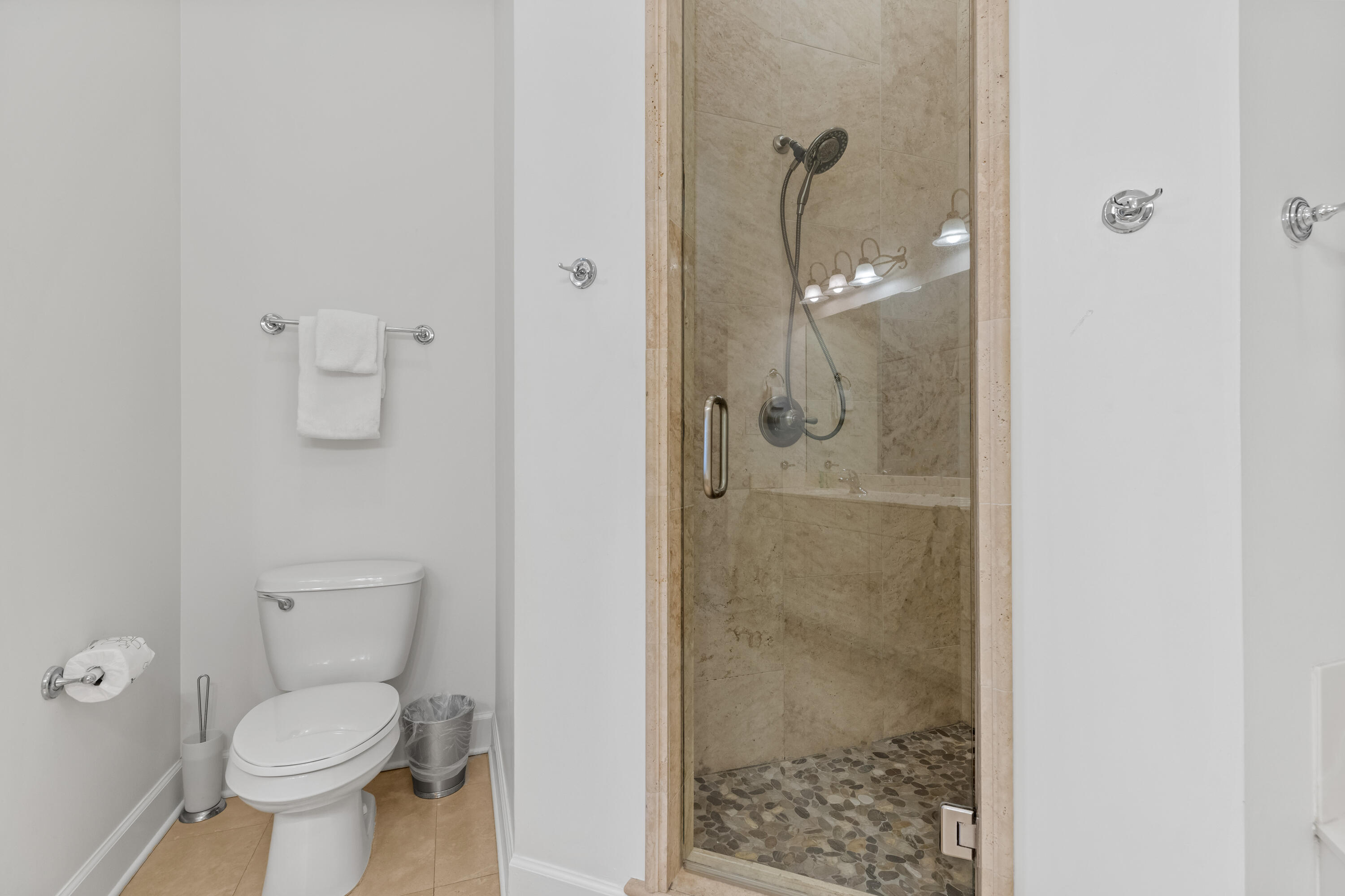 10343 East County Highway 30A, Unit 305 Inlet Beach, FL 32413 - Photo 25 of 32 a bathroom with a granite countertop toilet a shower and a sink