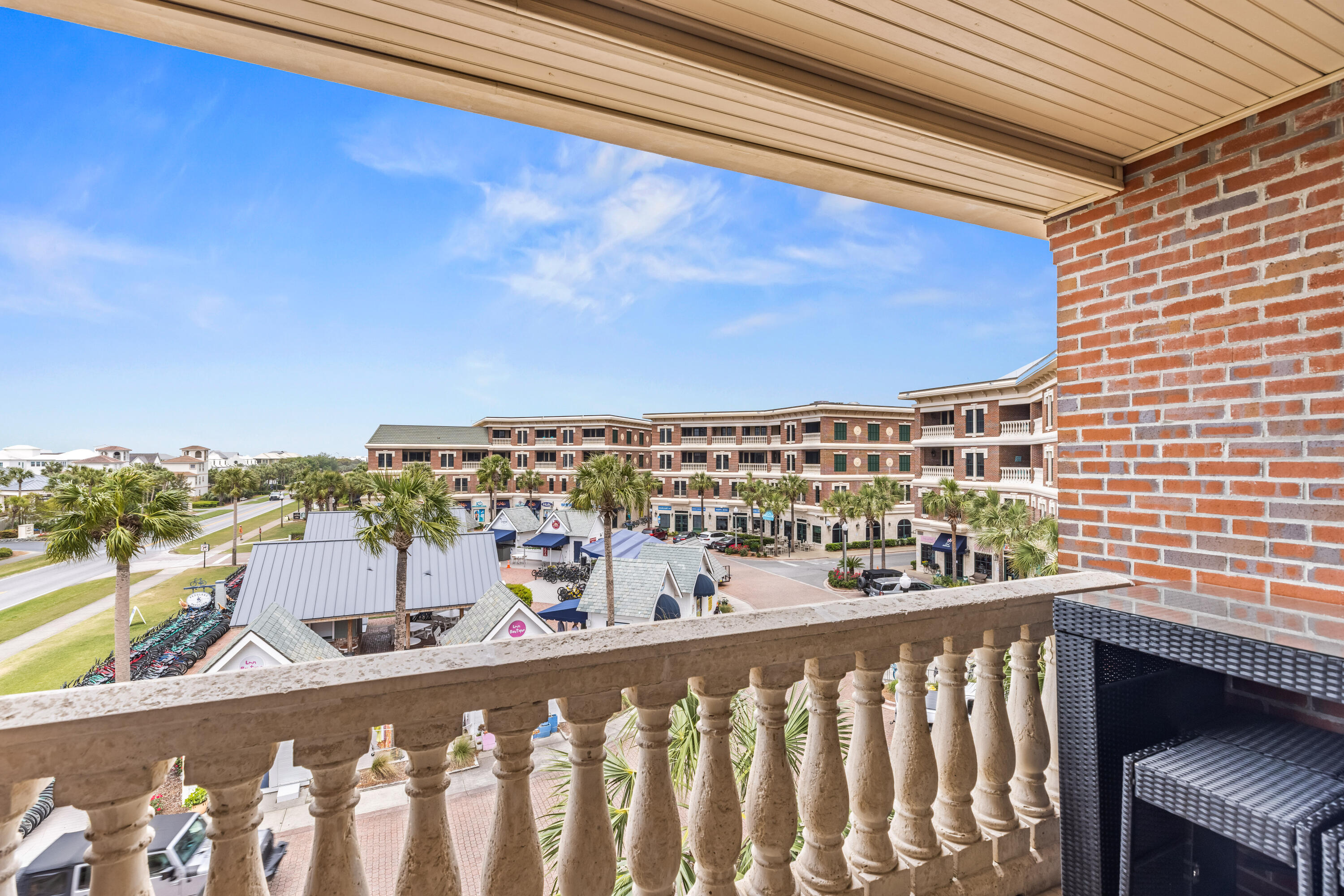 10343 East County Highway 30A, Unit 305 Inlet Beach, FL 32413 - Photo 27 of 60 a view of a balcony with wooden floor and city view