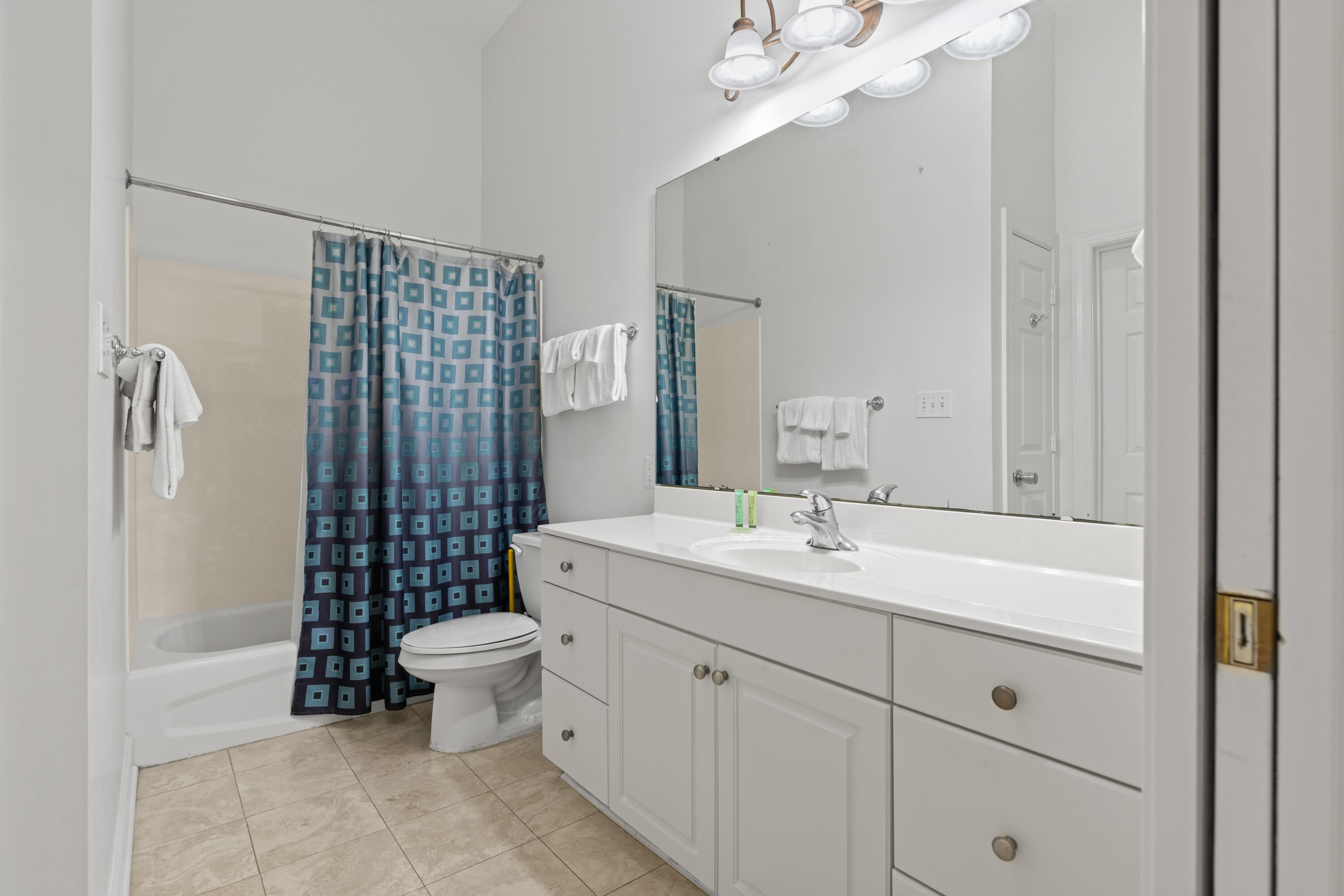 10343 East County Highway 30A, Unit 305 Inlet Beach, FL 32413 - Photo 32 of 32 a bathroom with a sink a toilet and shower