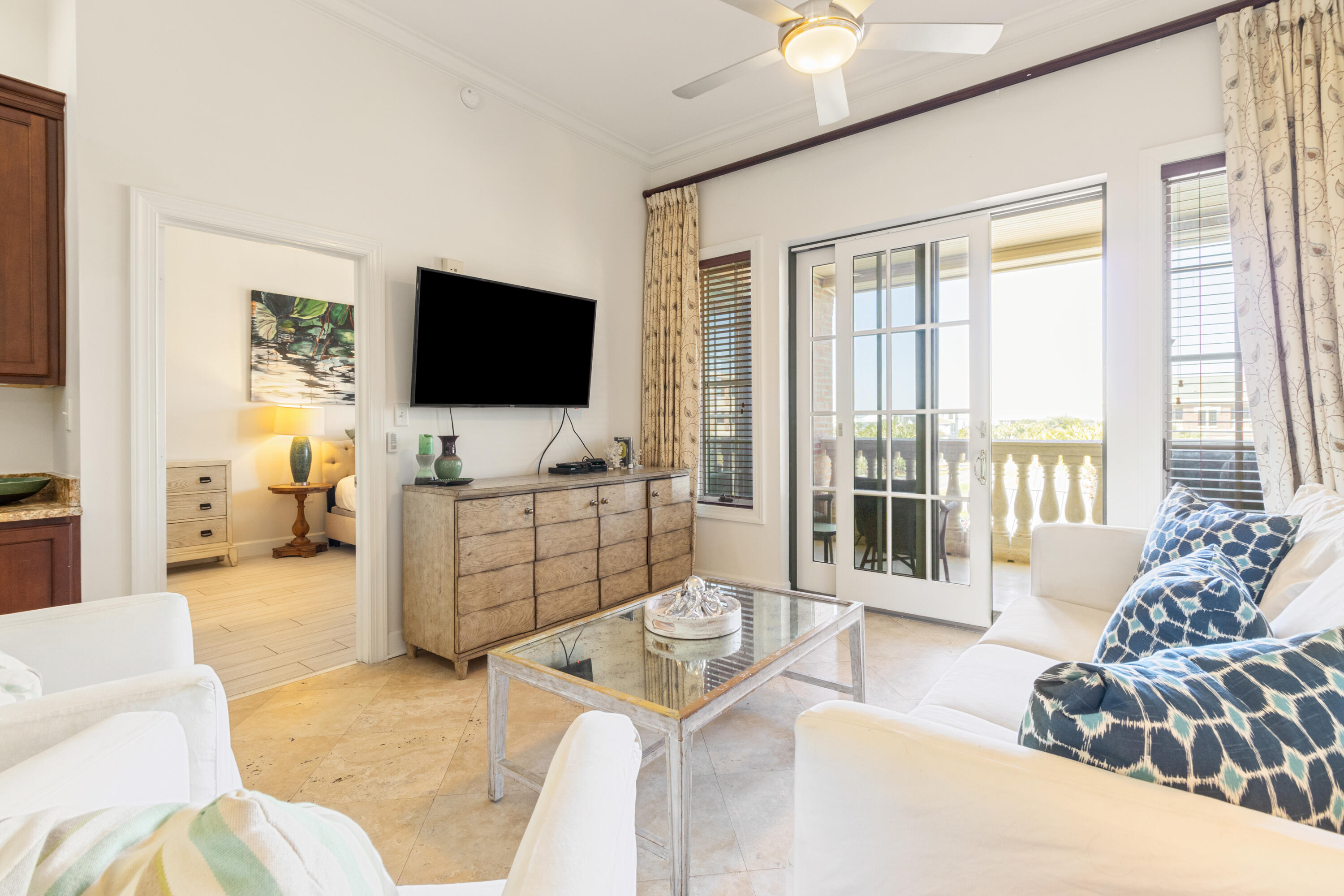 10343 East County Highway 30A, Unit 305 Inlet Beach, FL 32413 - Photo 35 of 60 a living room with furniture and a flat screen tv