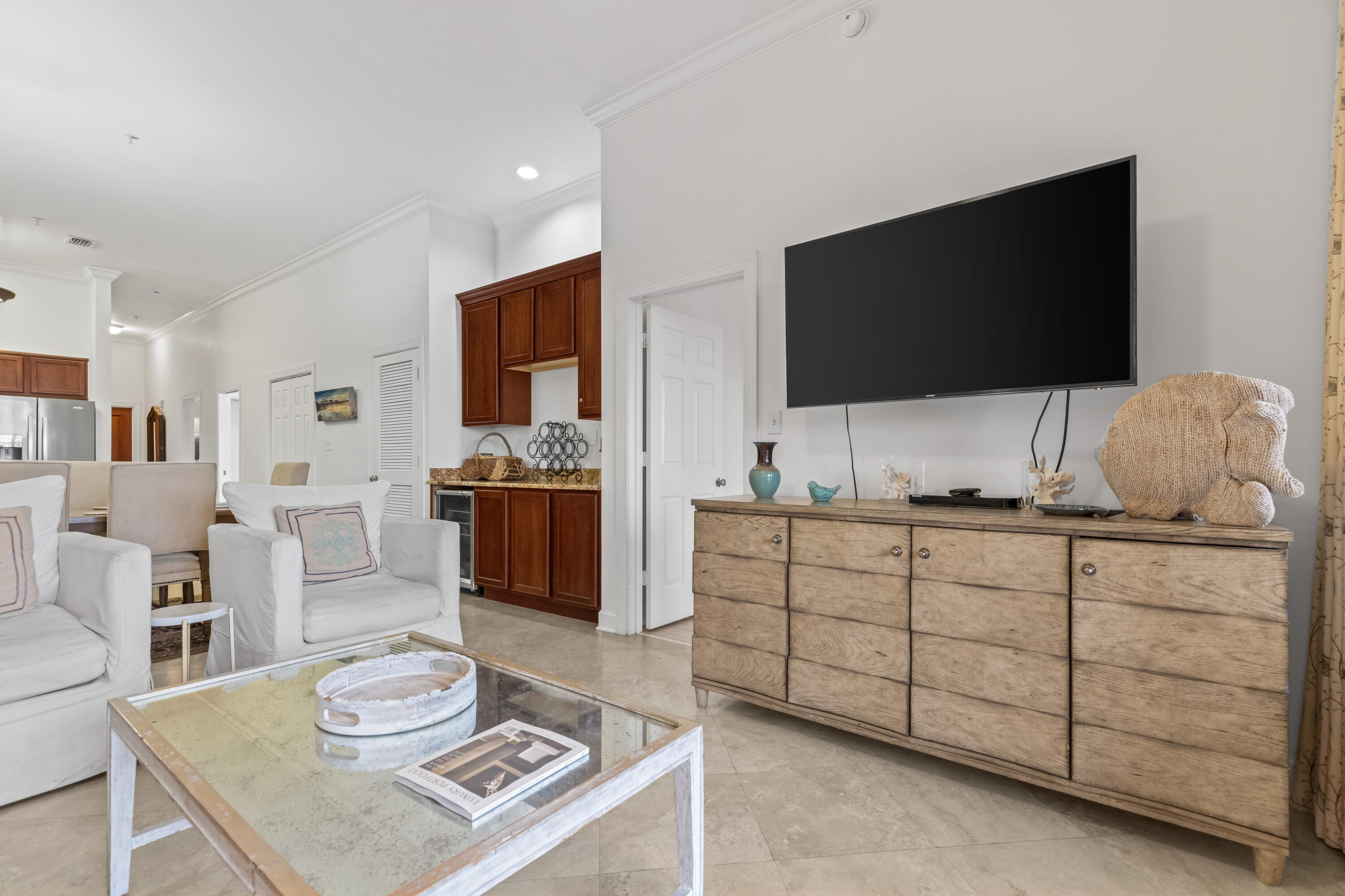 10343 East County Highway 30A, Unit 305 Inlet Beach, FL 32413 - Photo 38 of 60 a living room with furniture and a flat screen tv