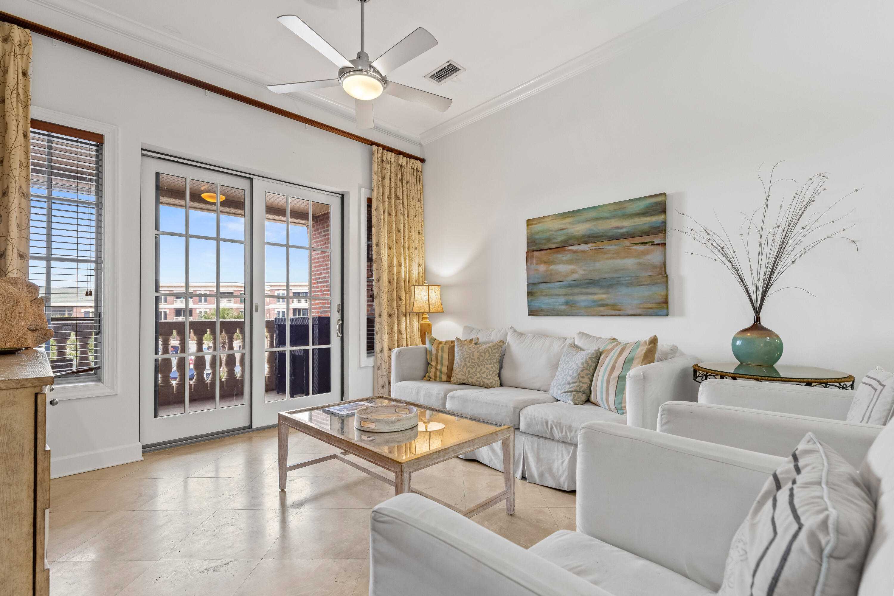 10343 East County Highway 30A, Unit 305 Inlet Beach, FL 32413 - Photo 41 of 60 a living room with furniture and a floor to ceiling window