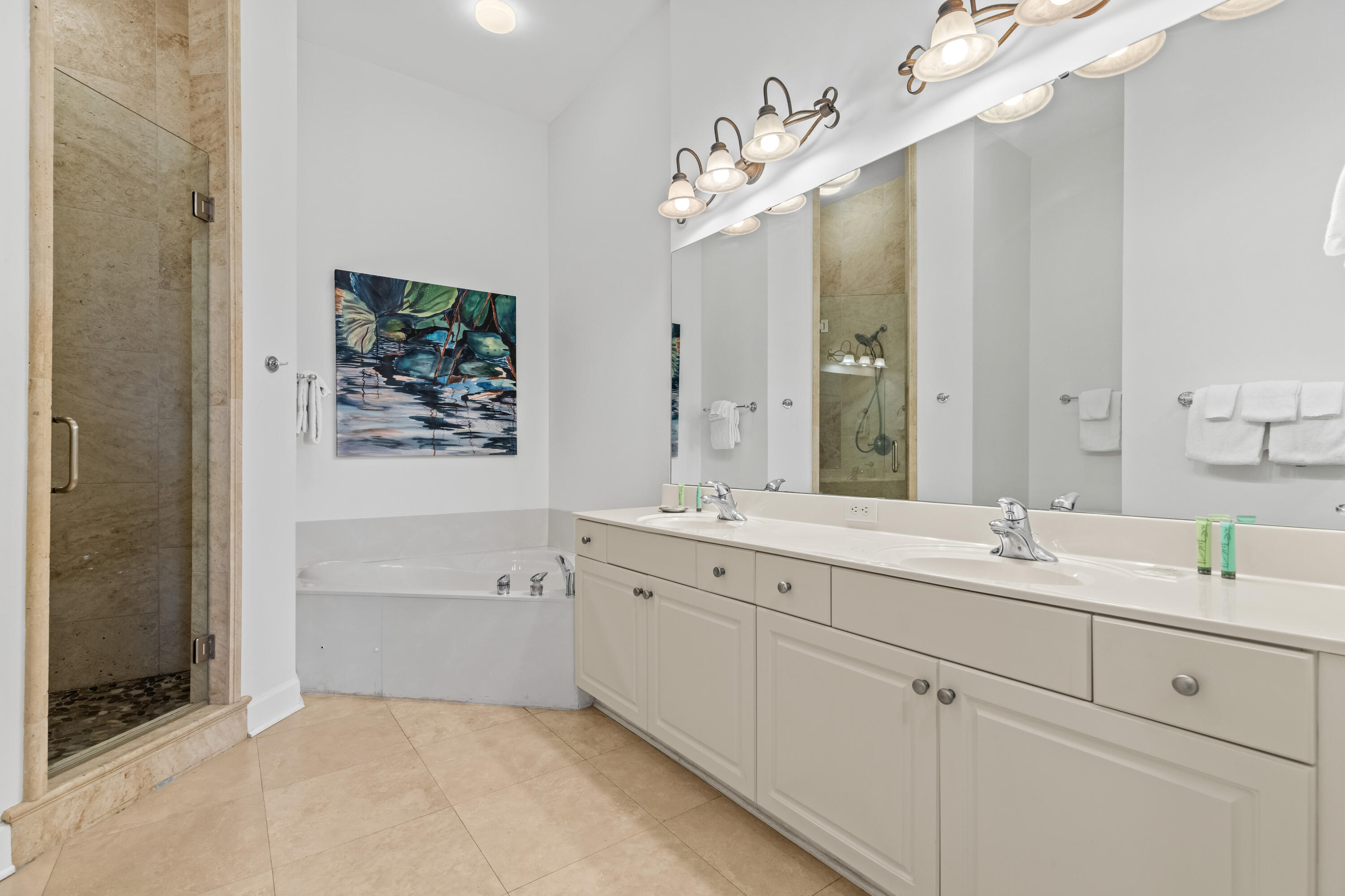 10343 East County Highway 30A, Unit 305 Inlet Beach, FL 32413 - Photo 48 of 60 a spacious bathroom with a double vanity sink mirror and bathtub