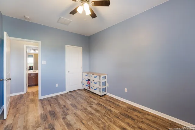 a bathroom with a sink toilet a mirror and shower