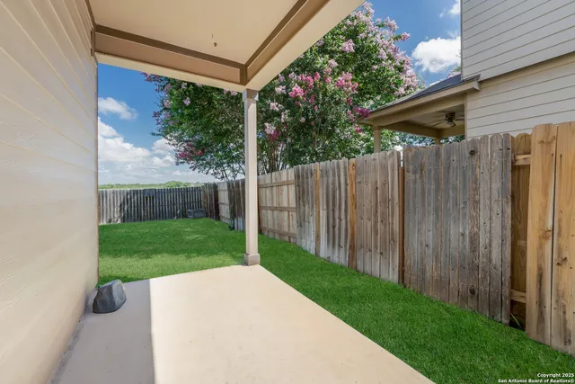 a house view with a garden space