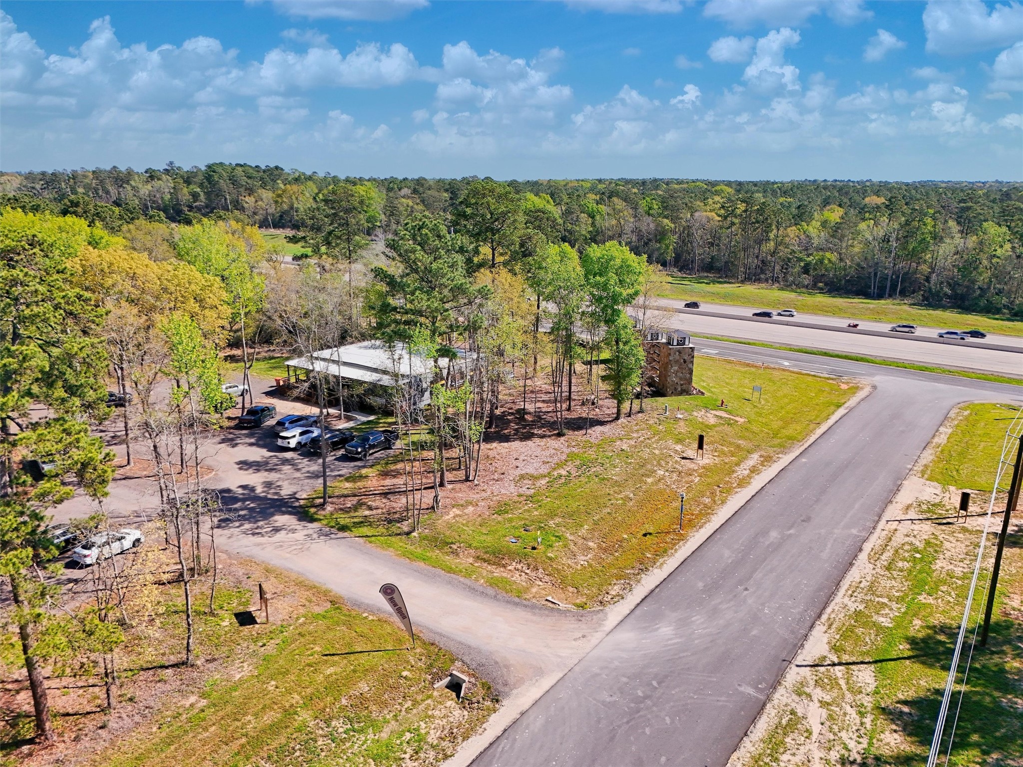 111 Rustic Ranch Drive New Waverly, TX 77358 - Photo 9 of 9 Welcome to the Estates of Grand Texas—an acreage community featuring a grand entrance and a serene country setting with convenient access to nearby amenities.
