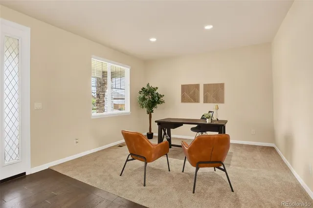 a view of a livingroom with furniture