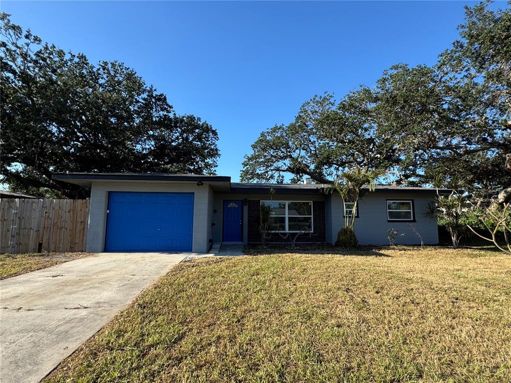 426 Magnolia Road Venice, FL 34293 - Photo 1 of 1 a view of a house with a yard