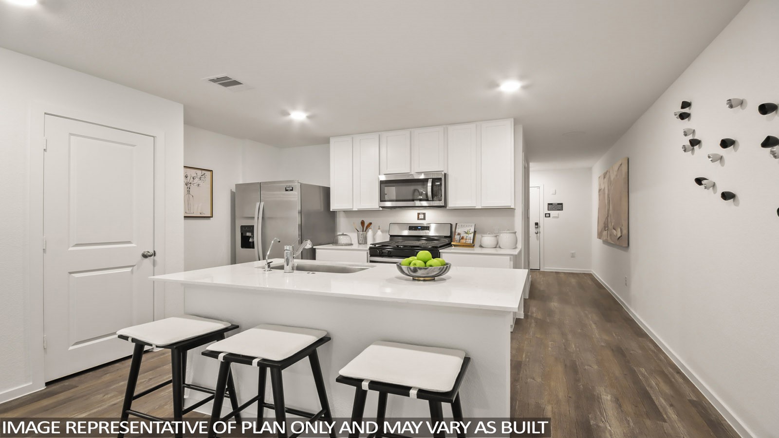949 Sutherland Falls Street Conroe, TX 77303 - Photo 1 of 30 a kitchen with a dining table chairs and refrigerator