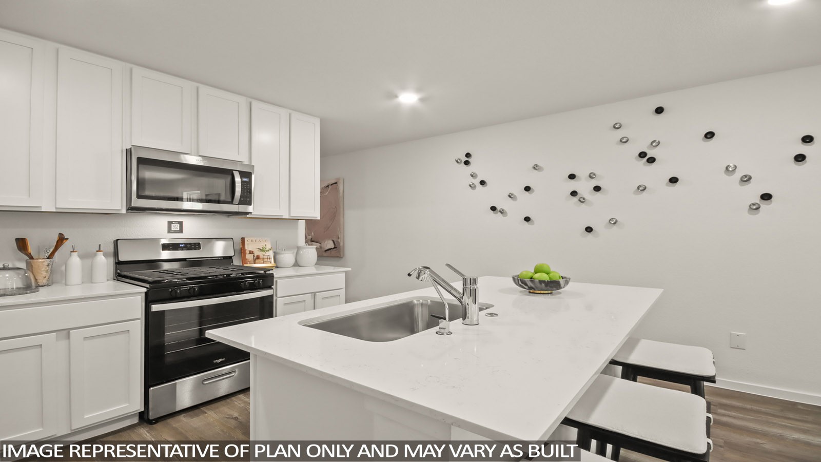 949 Sutherland Falls Street Conroe, TX 77303 - Photo 4 of 30 a kitchen with granite countertop a sink dishwasher stove and microwave with wooden floor