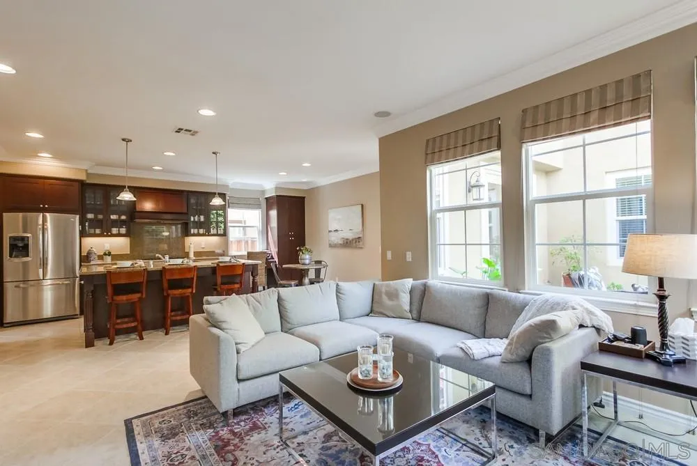 2665 Paradise Road Carlsbad, CA 92009 - Photo 15 of 52 a living room with furniture kitchen view and a large window