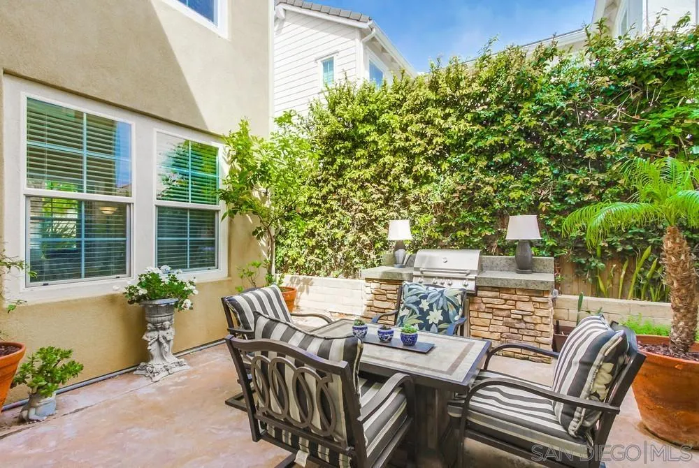 2665 Paradise Road Carlsbad, CA 92009 - Photo 16 of 52 a view of a patio with a table and chairs in patio